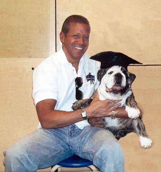 Gig Schmidt and Mugsy, puppy graduation, May 30, 2009